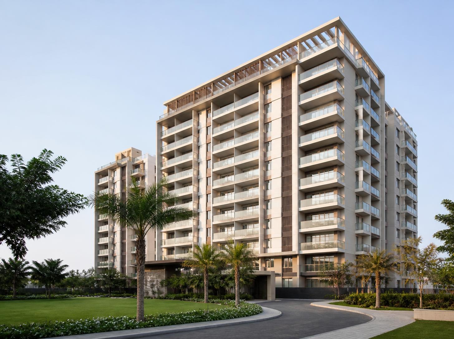 Modern residential apartment tower with landscaped grounds